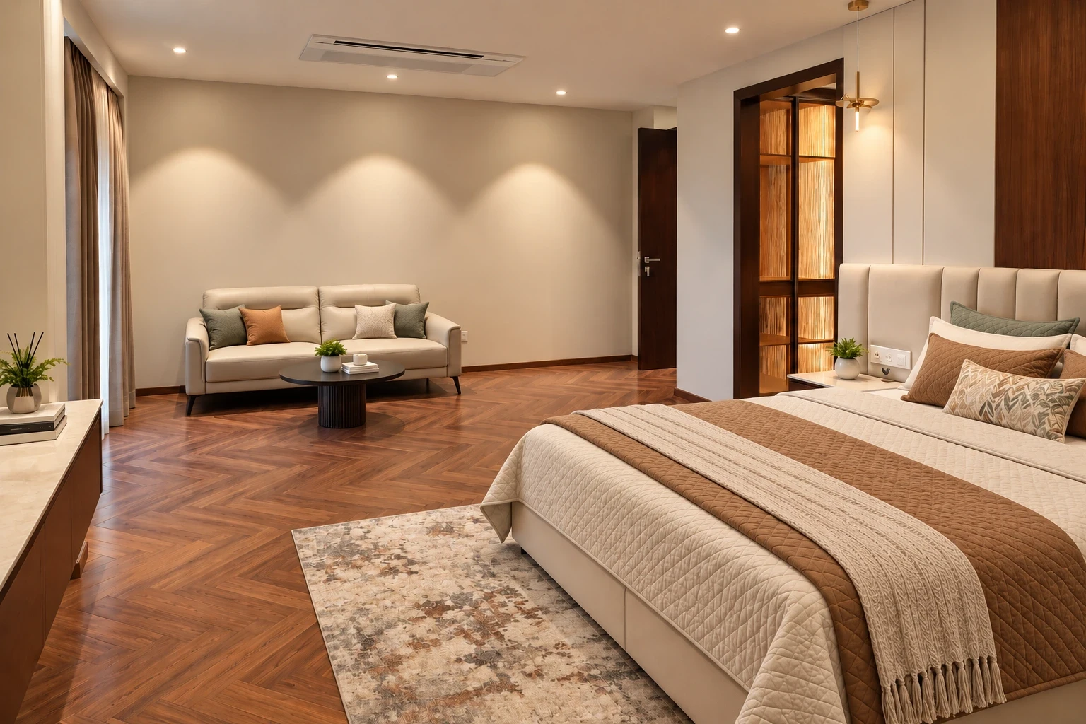 Palam View bedroom with an upholstered bed, herringbone wood flooring and a sofa seating area