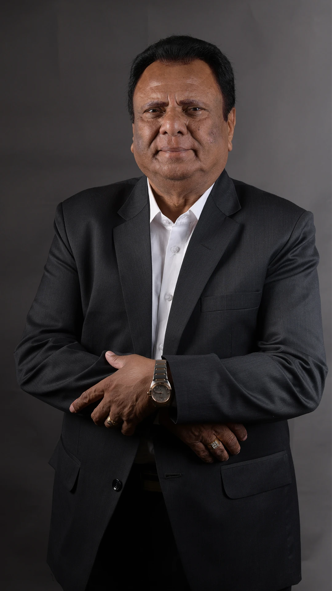Formal portrait of Shri Suresh Pal, Chairman of SM Pal Group